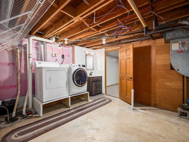 laundry room with sink and independent washer and dryer