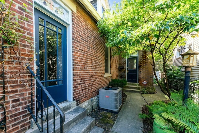 property entrance featuring cooling unit