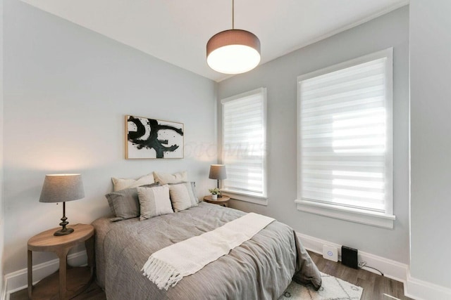 bedroom featuring dark hardwood / wood-style floors