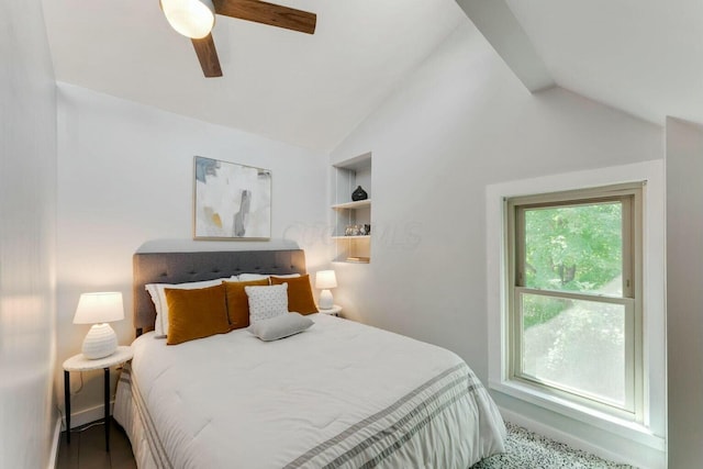 bedroom with ceiling fan and lofted ceiling