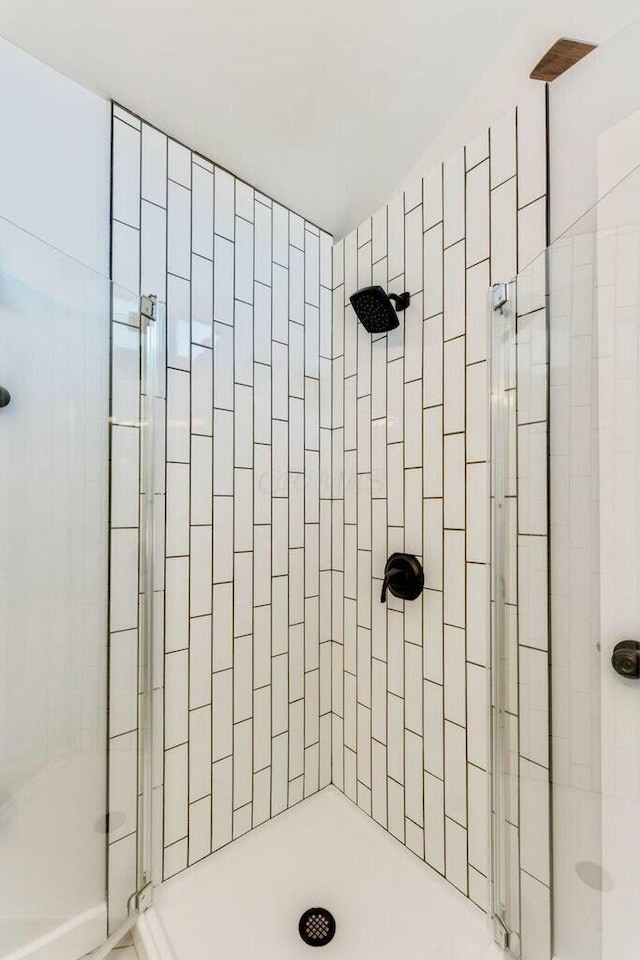 bathroom featuring walk in shower