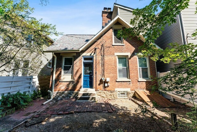 rear view of property with a patio area