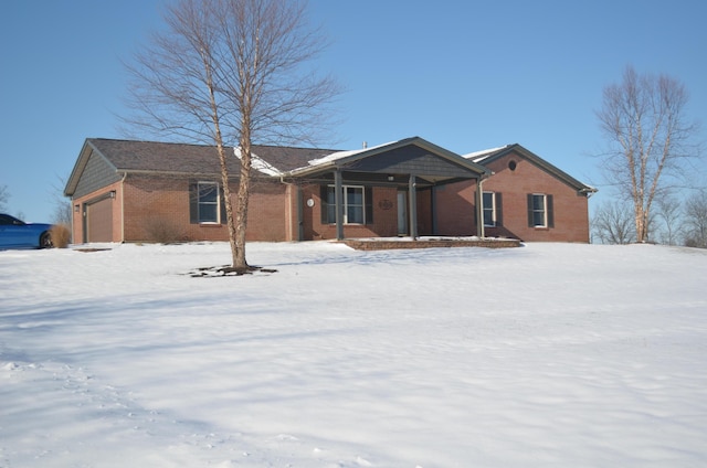 single story home featuring covered porch