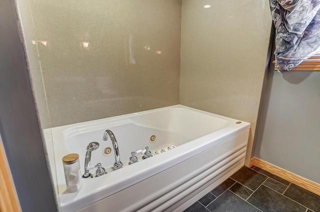 bathroom featuring a bathtub and tile patterned floors