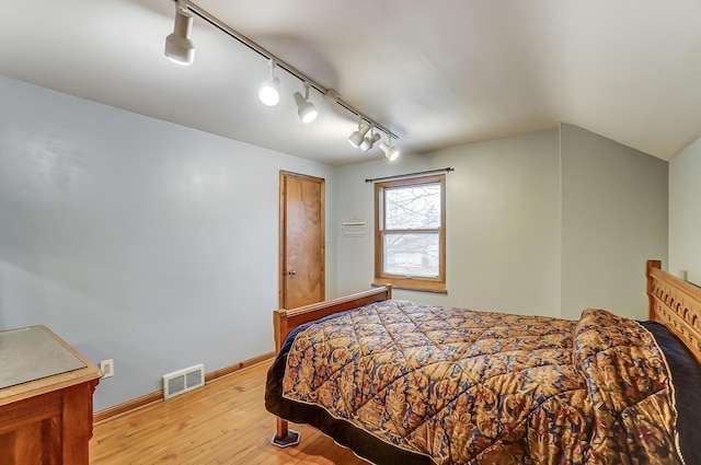 bedroom featuring light hardwood / wood-style flooring