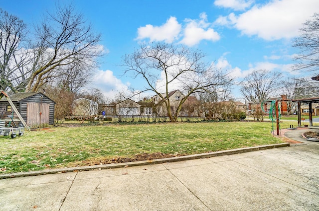 view of yard featuring a playground and a storage unit