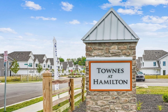 view of community sign