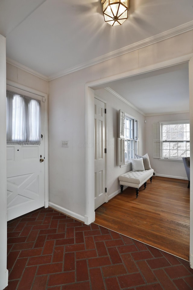 entrance foyer featuring crown molding