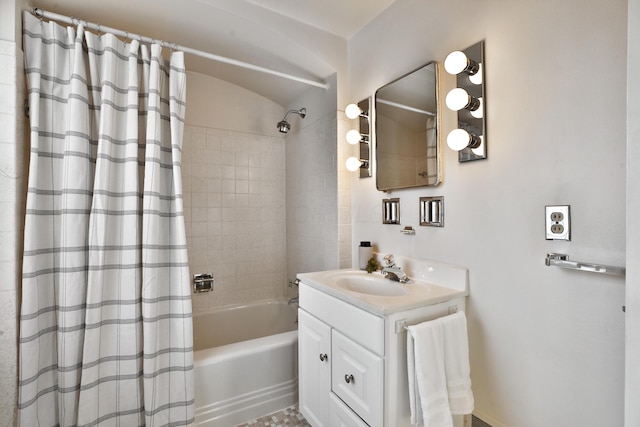 bathroom featuring vanity and shower / tub combo with curtain