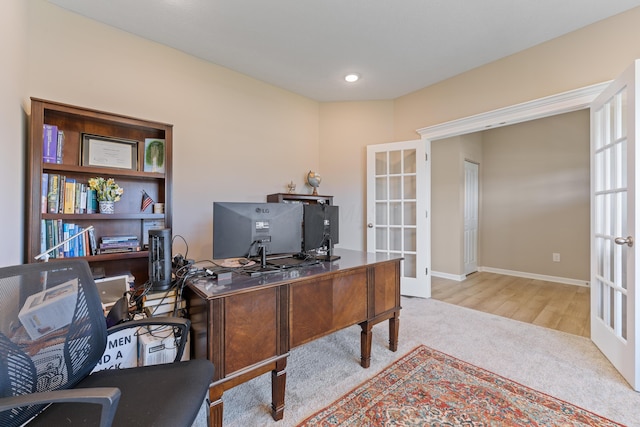 office featuring light colored carpet and french doors