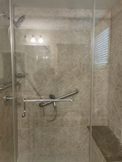 5735 Newbank Cir Unit 208, Dublin, OH 43017 - bathroom featuring a shower with shower door