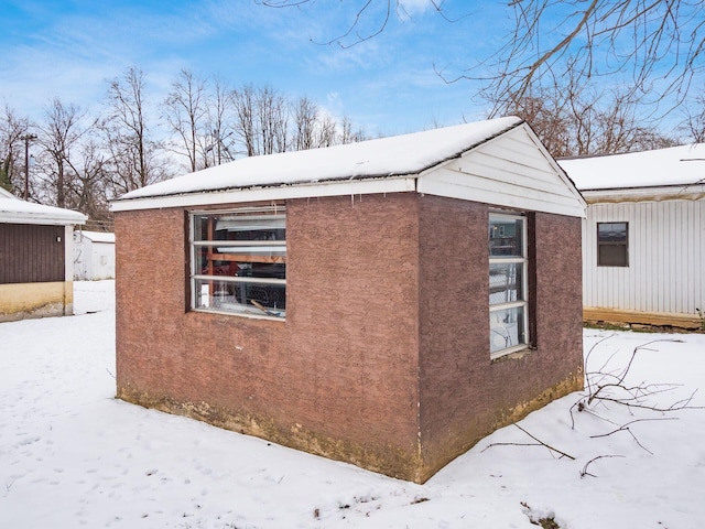 view of snow covered property