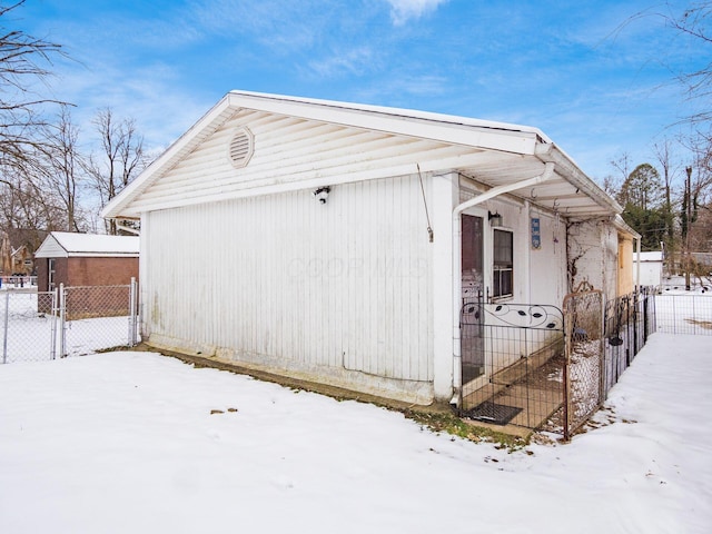 view of snow covered property