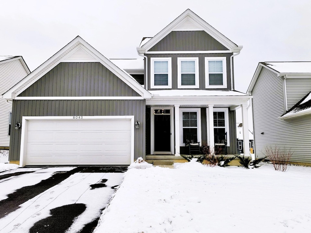 view of front of property with a garage