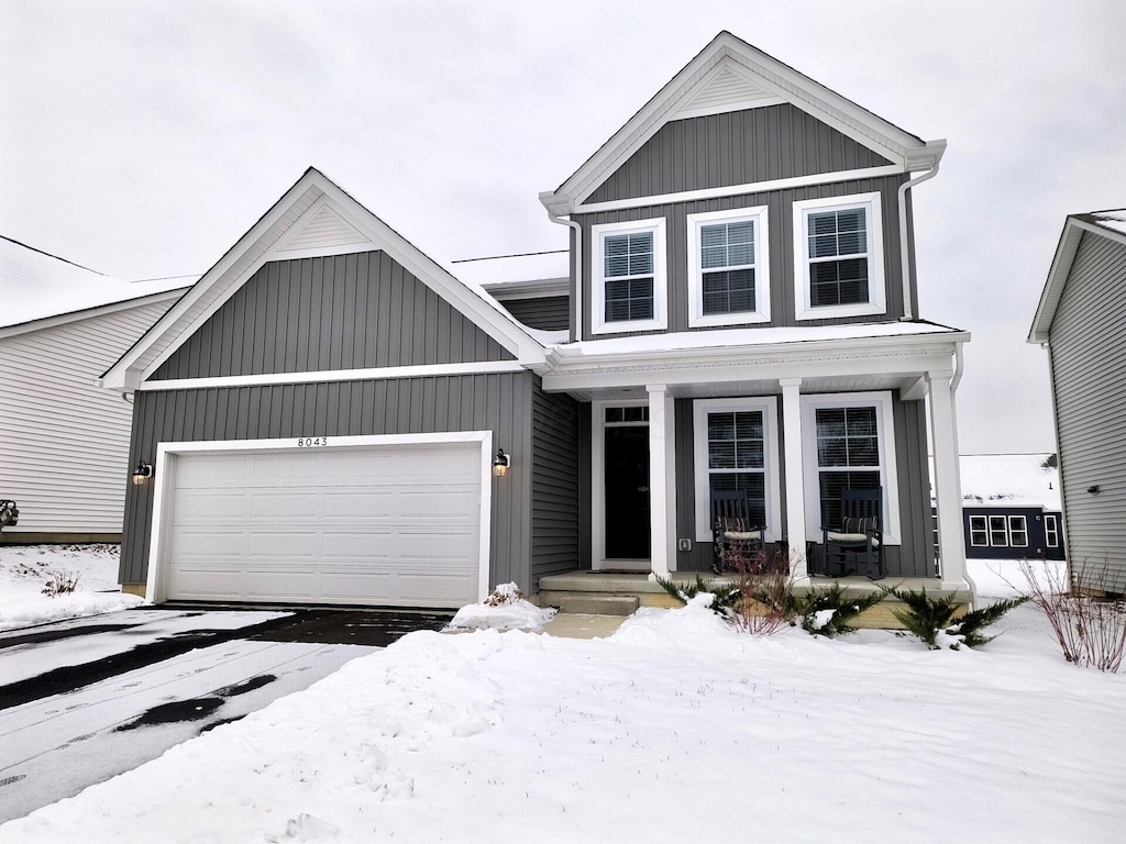 view of front of property featuring a garage