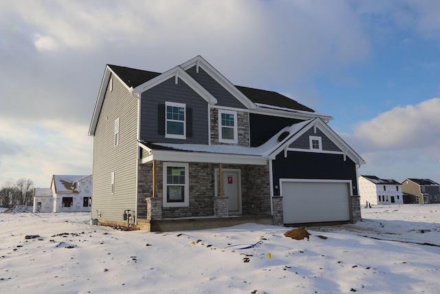 craftsman-style home with covered porch and a garage