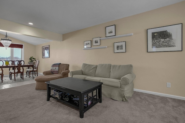 carpeted living room with vaulted ceiling with beams