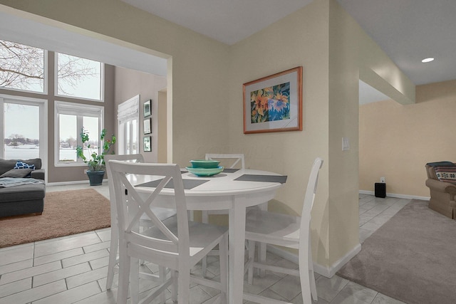 dining room featuring light tile patterned floors