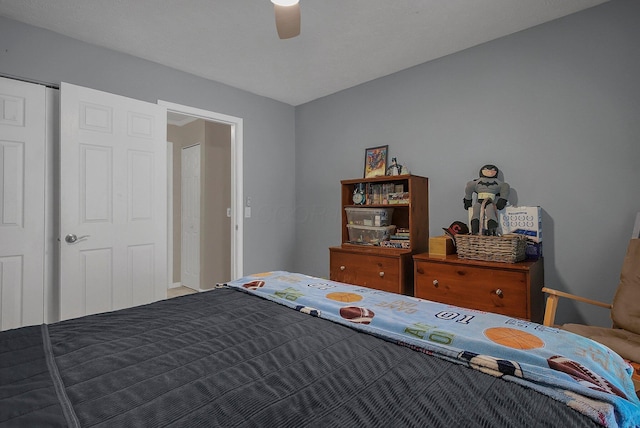 unfurnished bedroom with a closet and ceiling fan