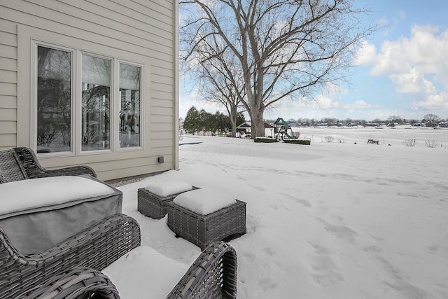 view of yard layered in snow