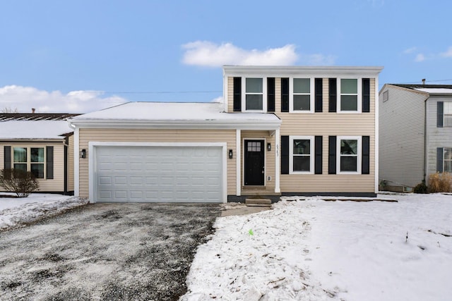 view of front of home with a garage