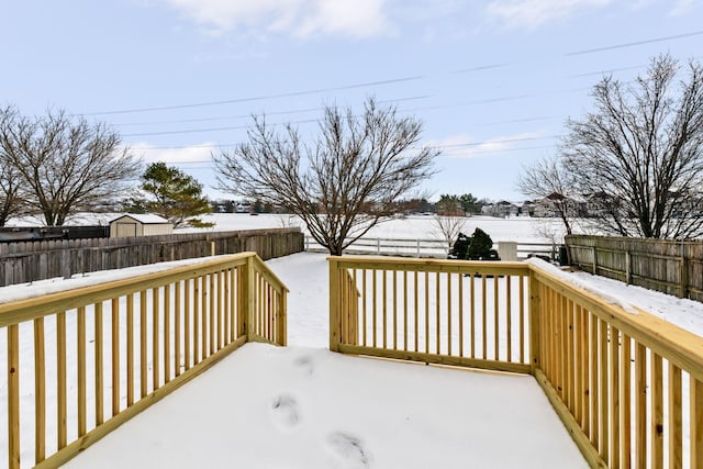 view of snow covered deck