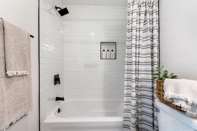 bathroom with shower / bathtub combination with curtain