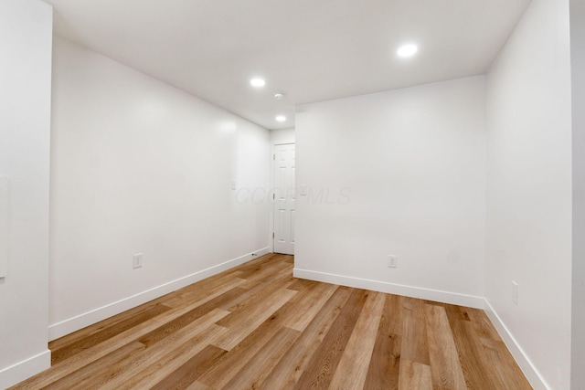 unfurnished room featuring light wood-type flooring