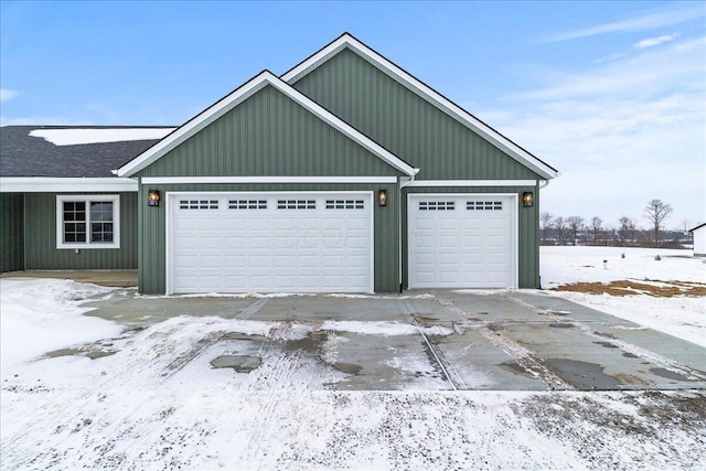 view of snow covered garage