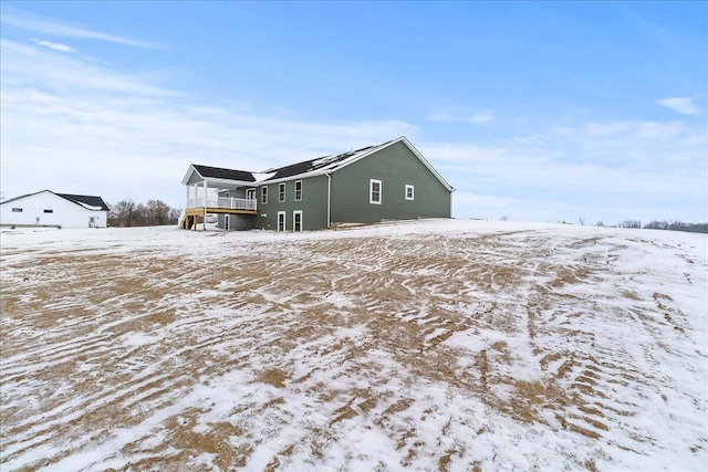 view of snow covered property