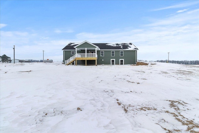 view of snow covered property