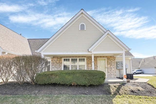 view of front of home with stone siding