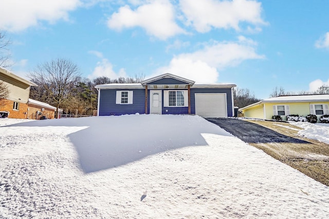 view of front of home featuring a garage