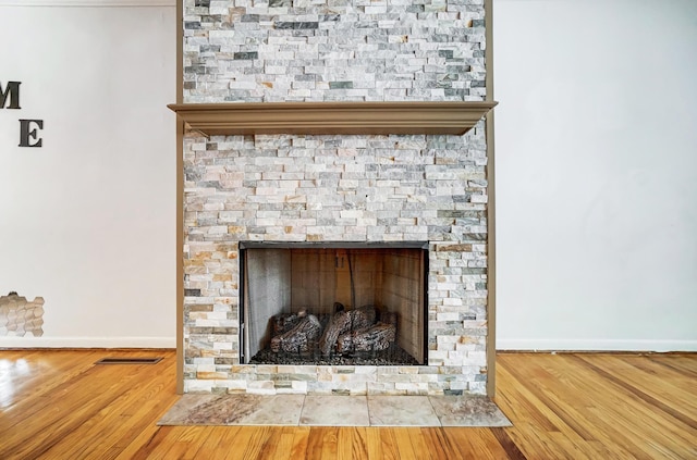 interior details featuring hardwood / wood-style flooring