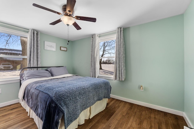 bedroom featuring ceiling fan and hardwood / wood-style floors