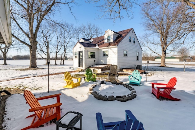 view of snow covered house