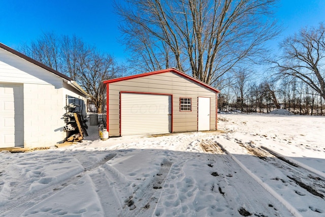 view of snow covered garage