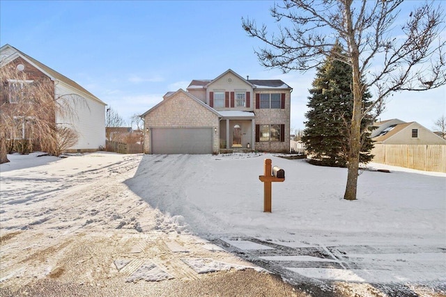 front of property featuring a garage