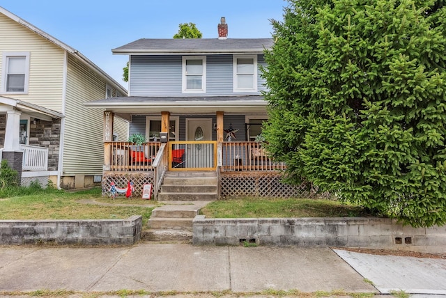 view of front of property featuring covered porch