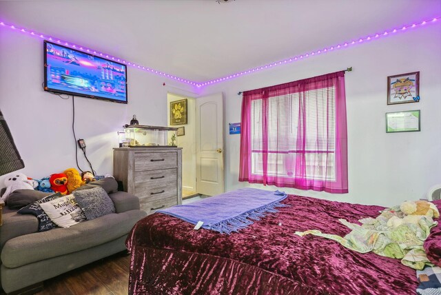 bedroom featuring hardwood / wood-style floors