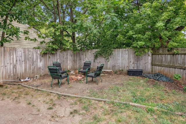 view of yard featuring a fire pit