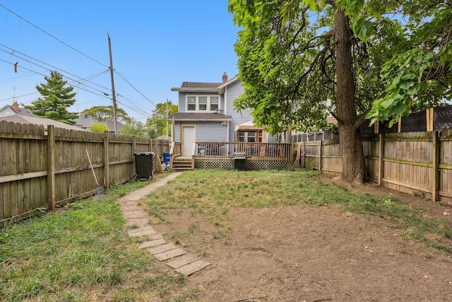 view of yard featuring a deck