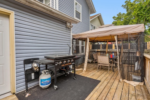 wooden terrace with a gazebo