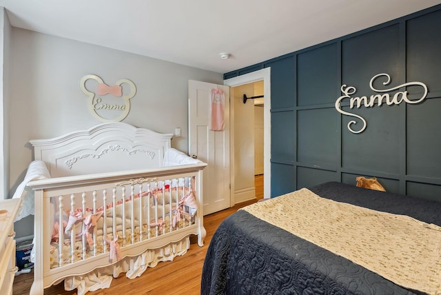 bedroom featuring wood-type flooring