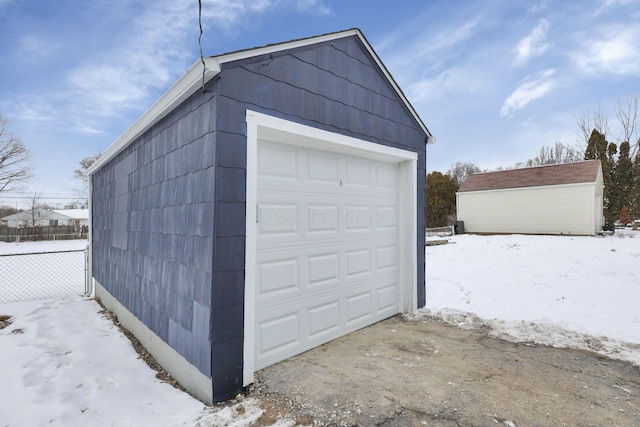 view of snow covered garage