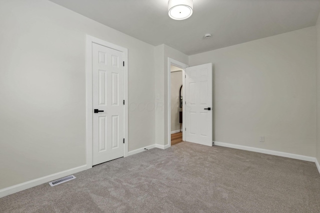 unfurnished bedroom featuring carpet floors