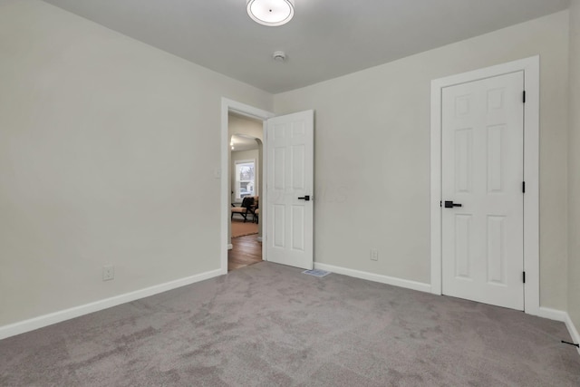 unfurnished bedroom featuring carpet floors