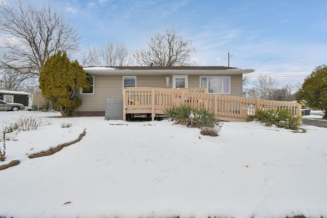 ranch-style home featuring a deck