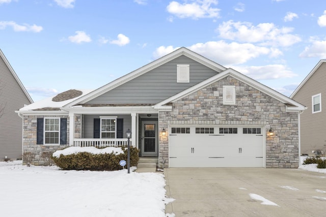 view of front of property with a garage and covered porch