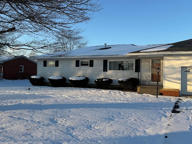 view of snow covered property